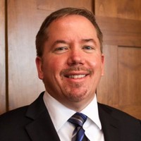 Scott E. Denman