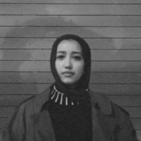 Manar H.