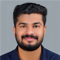Rishad C