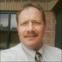 Tim Hughes