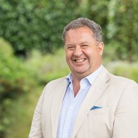 Simon Diggins OBE  M Phil,  BA Hons