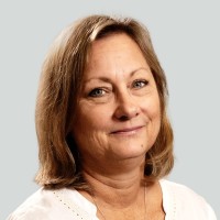 Suzi E.