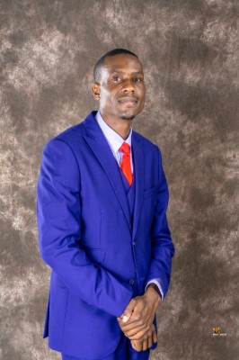 Adrian Coleen (He/Him) Nyagomo