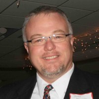 John D. Dingess