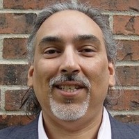 Tom E. Gonzales