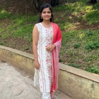 Nisha J