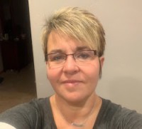 Nikki E.