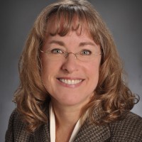 Kim M. Reid, MBA, FACHE, RHIA