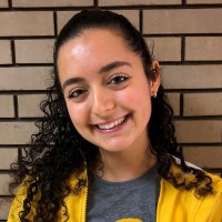 Nicole Raulli She/Her/Hers