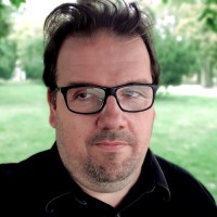 Dr. Axel Ország-Krisz