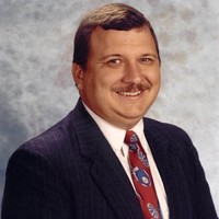 John E.  