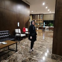 Aminah M