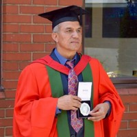 Dr Er Jiban Karki (PhD, MA, BE Civil, BBA)