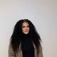 Adriane E.