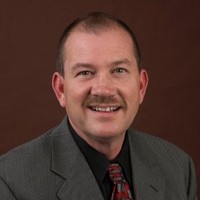 Dr. Mark A. Rumley