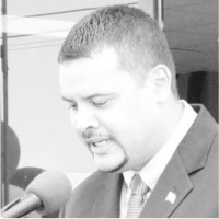 R. Gregory Oduber B.
