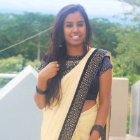 Darshini B