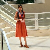 Nisha T