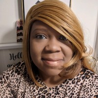 Denise M Trader