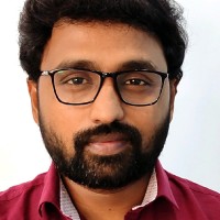 Devender M
