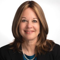 Lilian Abrams, Ph.D., MBA, MCC, ESIA