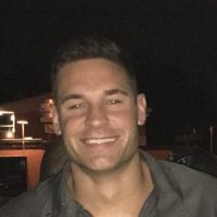 Justin Tomita Arm, Au, Cpcu