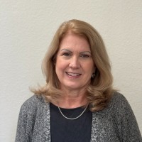 Laura J Coon