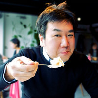 山口賢造