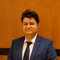 Dr Kundan Nivangune