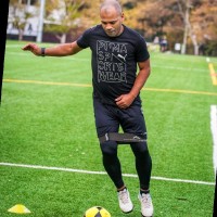 Maria Emerson (Coach M)