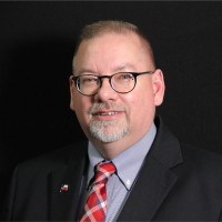 Bryan Hugghins, Cpm, Lcc