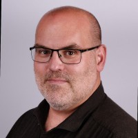 Neil Wallis, Mba