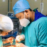 Dr Bingesh