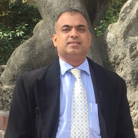Mangesh H.