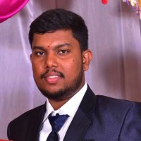 Mahesha D B