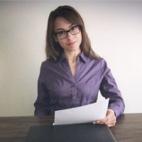 Gina M.