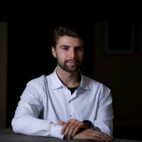 Bradley J Rost