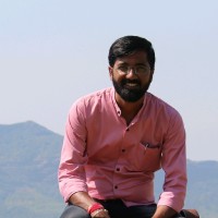 Suraj B.