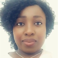 LOU  DORCAS TIECOURA