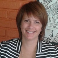 Caroline White, ADIQ