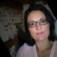 Corinne M