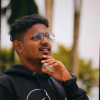 Dinesh T