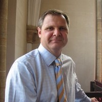Austin Lillywhite MBE MA FCMI FCILT