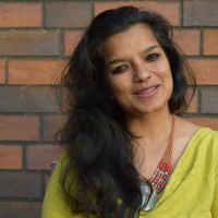 Tasneem B