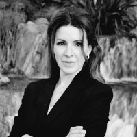 M. Magaly Huther