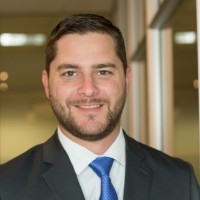 Justin Lee, Iom