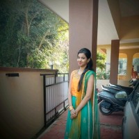 Nisha D
