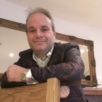 Andrew Moore FPFS, CDir