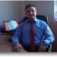 Suat E.