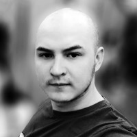 Михаил Романенко